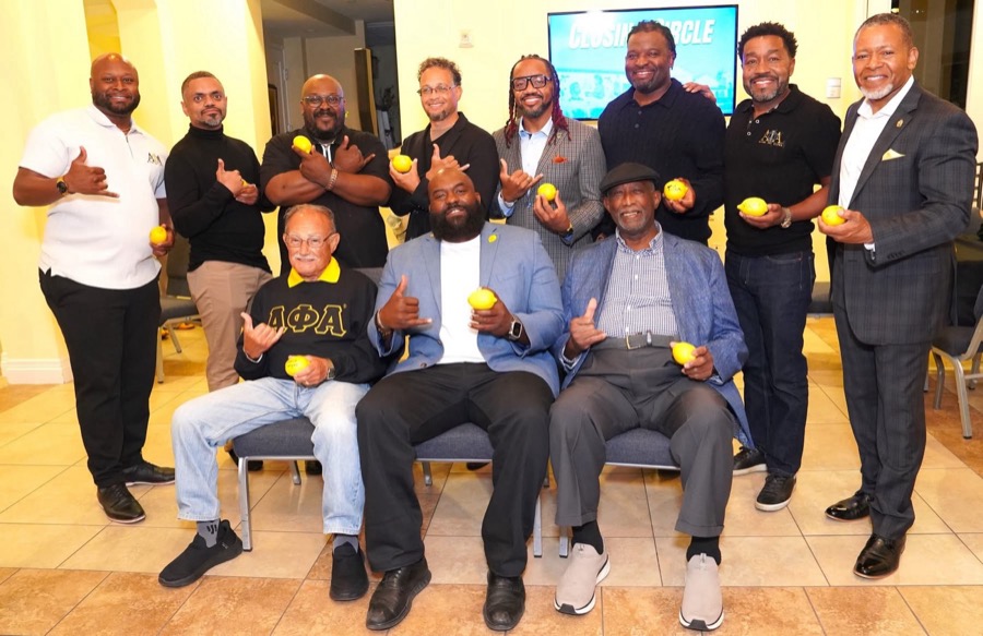 Joe Smith with community leaders at an evening event