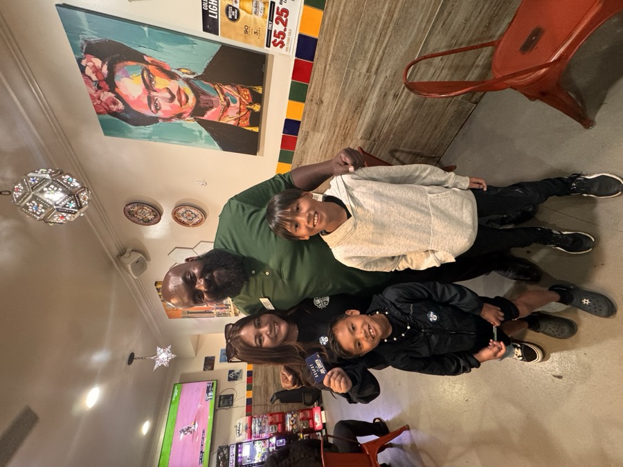 Joe Smith with a young family at a local restaurant