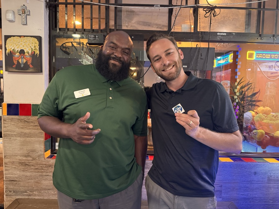 Joe Smith with a local supporter holding a campaign card