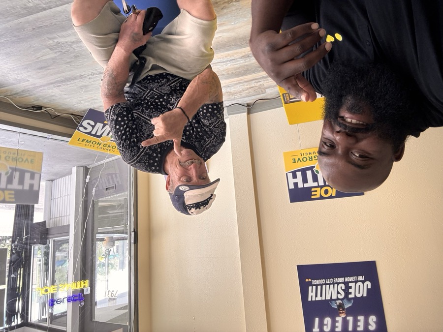 Joe Smith with a supporter at the campaign office