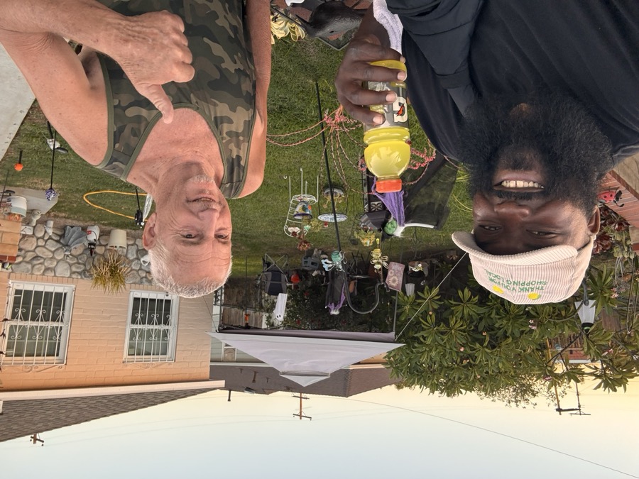 Joe Smith meeting a neighbor during door-to-door outreach