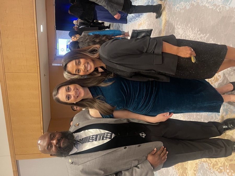 Joe Smith with community leaders at a formal event